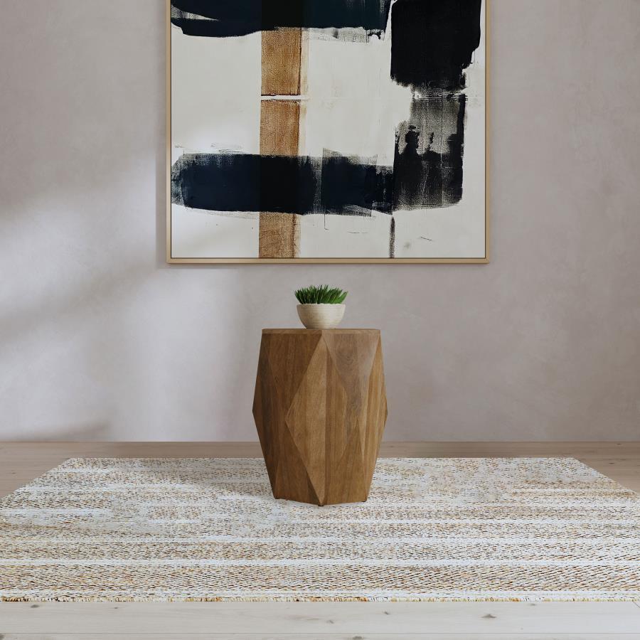This graceful accent table enriches any living room, blending artisan craftsmanship with a natural brown finish. Hand-hewn from solid mango wood, it offers subtle textures that elevate dÃ©cor. As a side table or occasional table, its versatile silhouette 