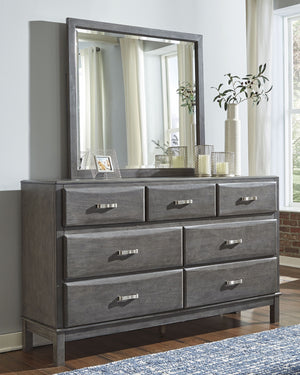 Contemporary style is shaping up beautifully. Designer elements are evident from every angle in this dresser and mirror. Quality crafted with dovetail construction, the dresserâ€™s contoured drawers offer ample storage options. Sleek and understated, this