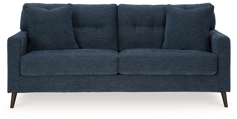 Feed your mid-century modern nostalgiaâ€”with a contemporary twist. A vibrant trend-right hue and comfy feel make this sofa perfect for lounging solo or with friends and family. Its linear profile adds plenty of fresh style, and the tapered accent legs ar