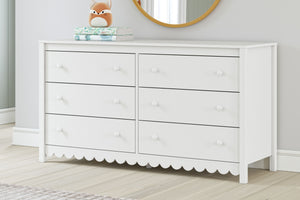  this dresser is the perfect fit for cottage or coastal farmhouse interiors. The matte white finish serves as the perfect backdrop to showcase your personal taste and creativity. And its spacious drawers let you say 