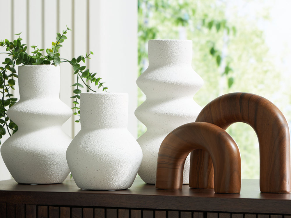 An eclectic mix of mod forms with faux wood and white finishes, this accessory set is a simply riveting ensemble. Its casual style is part classic, part contemporary and totally cool. Stage the pieces together for maximum impact, or spread them across you