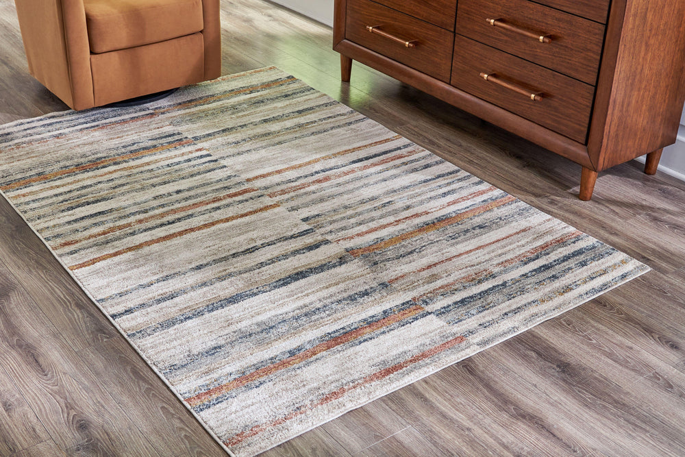 This rug enhances your home with a clean, modern touch. Featuring a stripe design, it provides plush comfort and neutral tones that fit most decors. The rug-'s richly understated palette keeps the look chic and upscale.<br/><br/><b>Product Features</b><ul