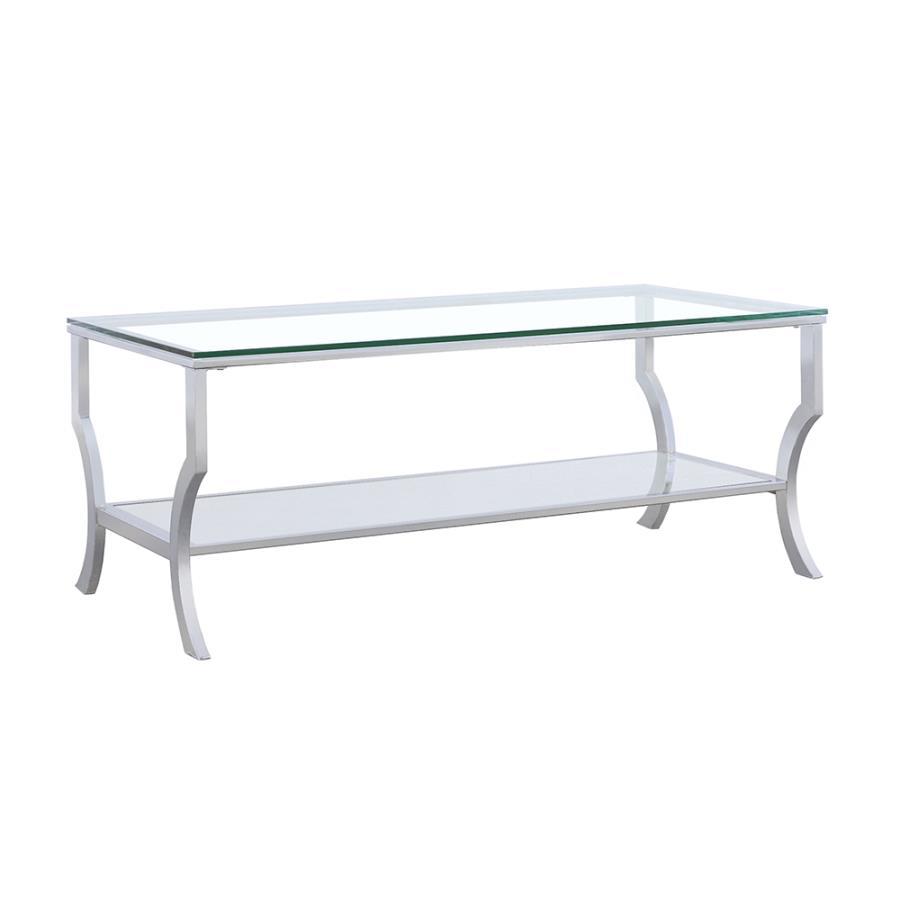 Elevate your living room with this sleek rectangular coffee table, featuring a clear tempered glass top and lower shelf for practical storage. The curved legs and open design create an airy, modern aesthetic. Constructed with a sturdy electroplated polish
