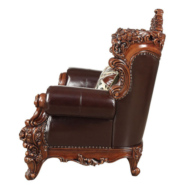  with its classics curve upholstered tight back wrapping around with an elegant cut out at the center top. T
