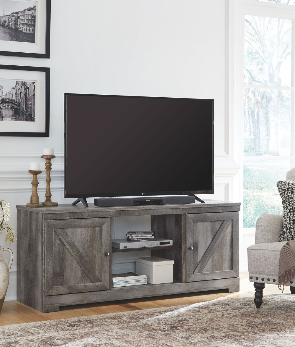 This entertainment center is sure to win your heart with its daring designer take on modern rustic. Its crisp, clean and minimalist-chic profile is enriched with a striking replicated oak grain with thick plank styling and a weathered gray finish for that