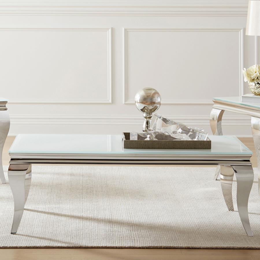 This coffee table showcases modern glam and functional sophistication with its tempered beveled glass top and polished stainless steel cabriole legs. The reflective finish and beautifully curved Queen Anne style legs offer a striking blend of timeless ele