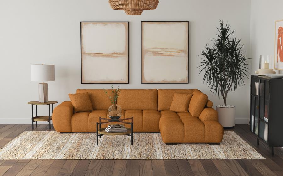 Finding inspiration in mid-century Italian furniture design, this L-shaped sectional sofa creates a rich, inviting ambiance in your living room. It boasts soft upholstery in a warm hue, creating the perfect gathering place for families and friends. Its co