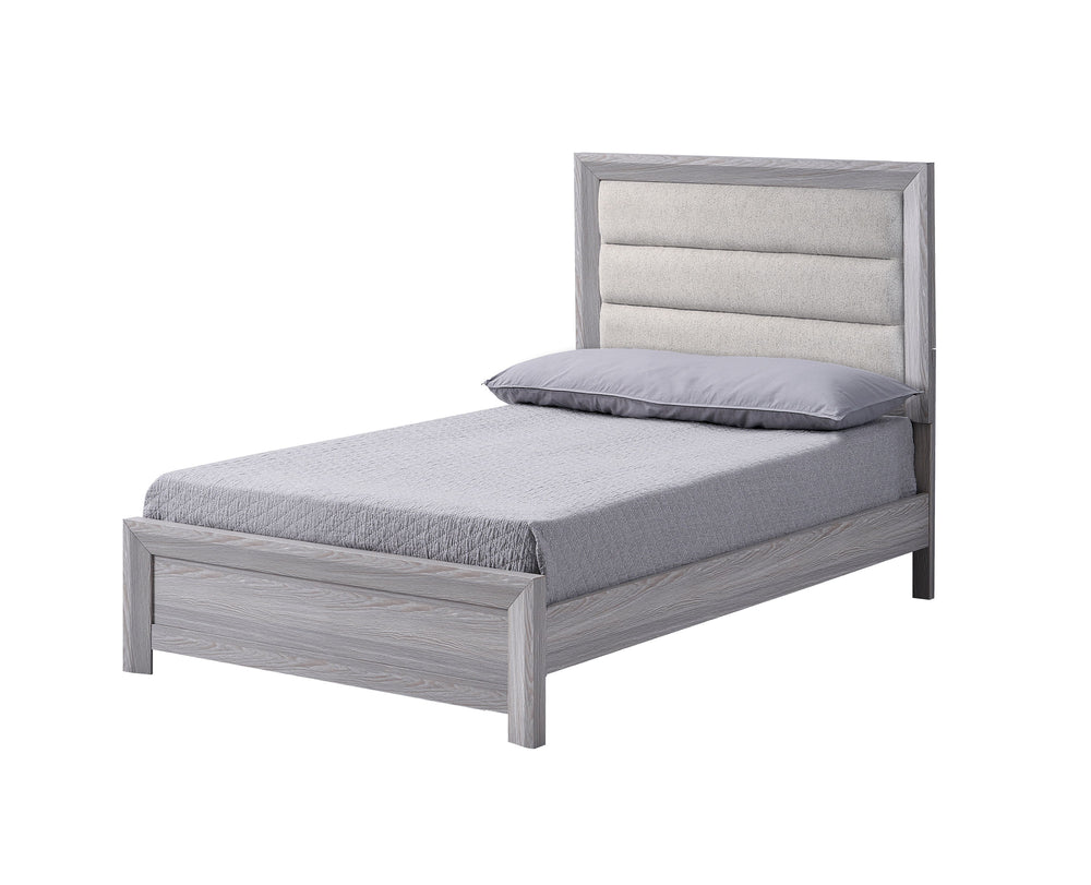 This bedroom set is the embodiment of understated sophistication, featuring a neutral drift wood finish that complements its clean and contemporary design. The robust bed frame anchors the room with a plush channel tufted headboard. Accompanying the bed a