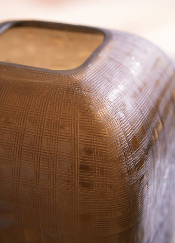  this vase boasts an eye-catching fine grid texture that-'s sure to make a statement. Fill it with florals