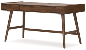 A refreshed take on retro aesthetics. This home office desk adds an air of playful simplicity to your workspace