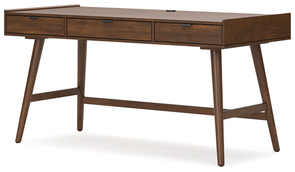 A refreshed take on retro aesthetics. This home office desk adds an air of playful simplicity to your workspace