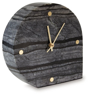 This table clock is a contemporary take on classic function. Crafted with black marble, it brings an elevated feel to tabletops and decorative displays. Staying on time has never been so stylish.<br/><br/><b>Product Features</b><ul><li>Made with black mar