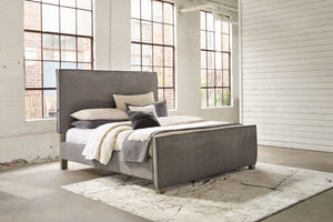  this queen upholstered panel bed seamlessly fits in with existing modern decor. Its clean-lined profile and tailored slate gray upholstery give an urban sophistication. This chic bed also features a doubl