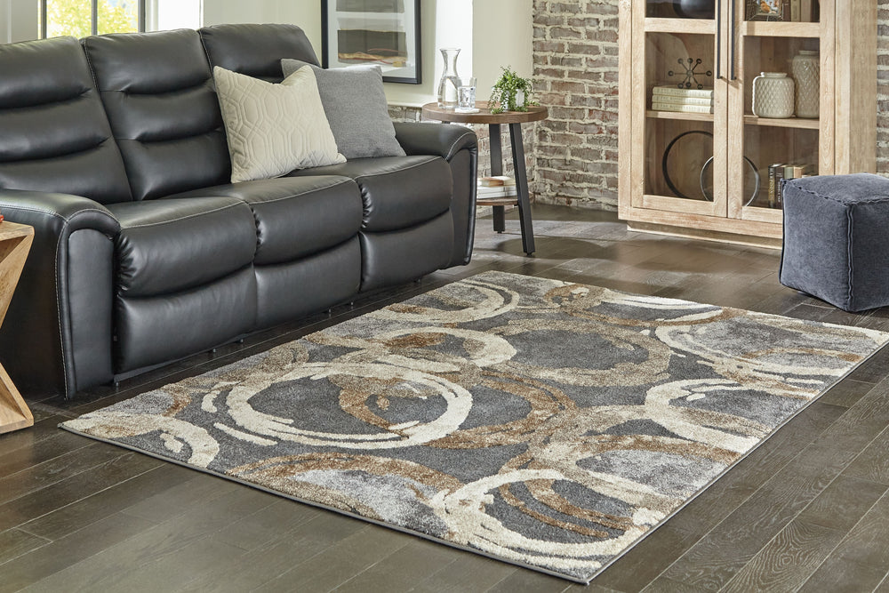 This area rug, with its abstract geometric design, is sure to be the highlight of the room. Featuring a low pile with added softness and durable construction, it will give your space a look that is unmistakably now.<br/><br/><b>Product Features</b><ul><li