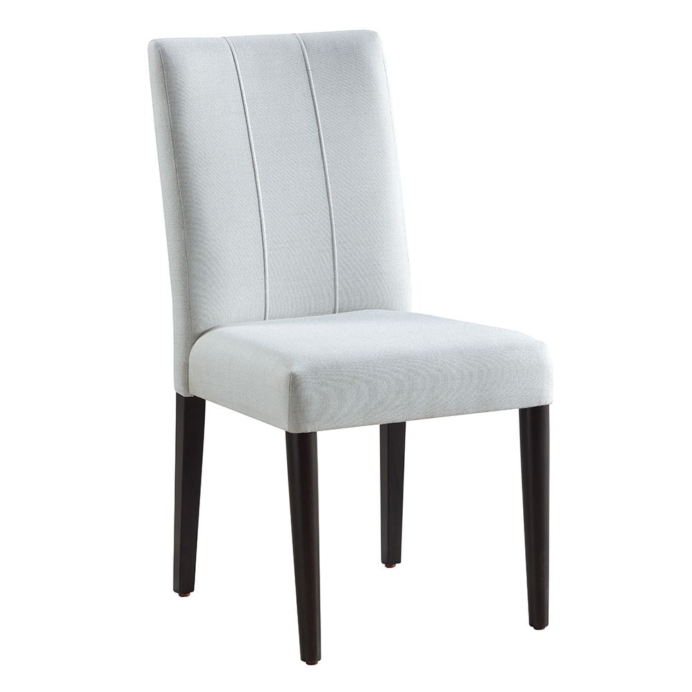 The Carena dining set exudes timeless elegance with its white and brown finish. The rectangular dining table features an extension top, perfect for hosting larger gatherings. Paired with stylish side chairs and a matching server, this set combines form an