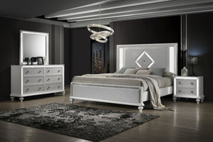 Transform your bedroom into a sanctuary of elegance with the Stardust 4 Piece Bedroom Suite in gleaming white. The set includes a Bed, Dresser, Mirror and Nightstand. Crafted to stand the test of time, each piece is meticulously constructed from manufactu
