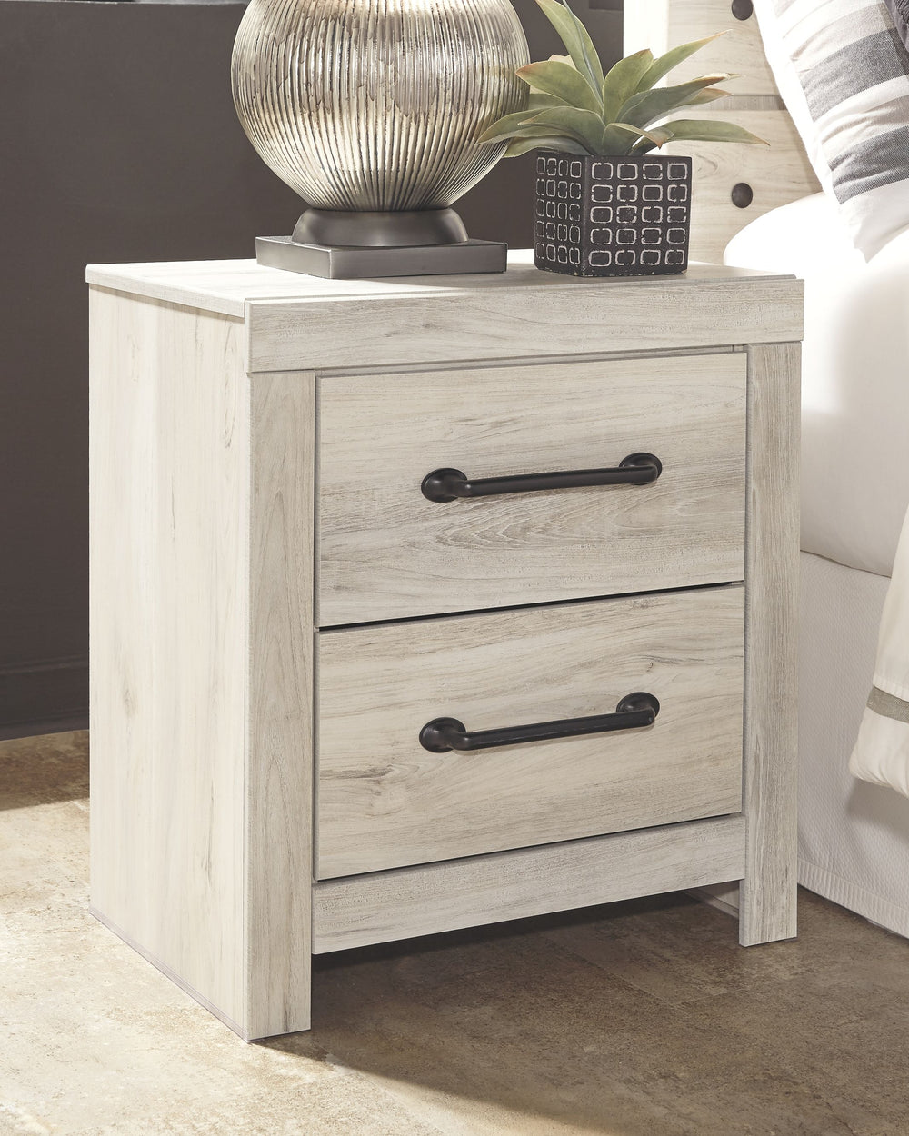 this nightstand makes itself at home. The wispy whitewash palette enhances without covering the grain for that weathered look you crave. Elongated drawer pulls ele
