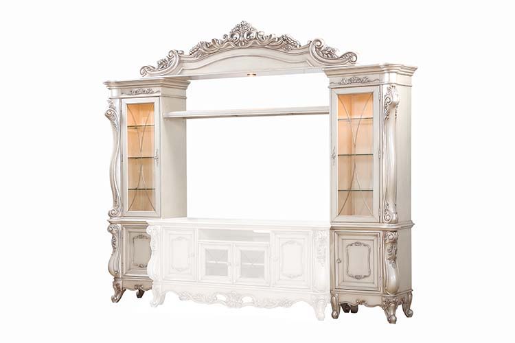 Exclusively designed and filled with romantic spirit, the beautiful Gorsedd entertainment center features Queen Anne legs and carved apron and trim, decorated with raised and oversized scrolled moldings in an antique champagne finish. This sophisticated l