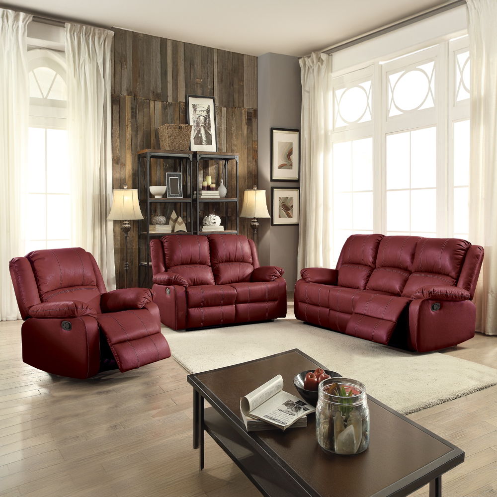 The Zuriel reclining sofa collection is a wonderful choice for any family room, combines luxurious faux leather with the comfort of padded, reclining seating. Comfortable contoured seats, soft to the touch while the reclining footrests offer full leg supp