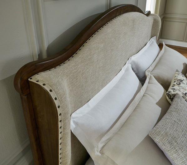 Sturlayne - Brown - Queen Upholstered Panel Bed