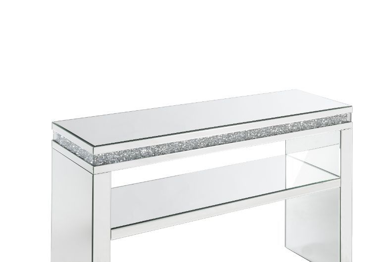 Undeniably magnificence with glam flair, this Noralie Sofa Table is meant to become your favorite focus in your living room. Mirrored accents with faux diamonds inlay achieve a modern glamour look. This piece makes a glam style statement that offers a sat