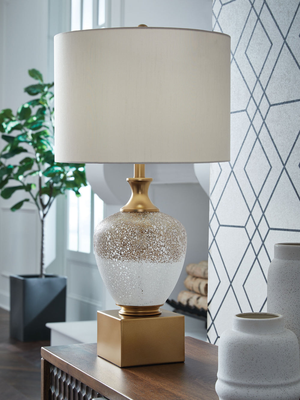 Stacked with traditional style. This table lamp is a stunning example of how awesome a multi-layered design can be. From the shifting colors of its urn-shaped art glass body to a base rich with goldtone touches, itâ€™s a beautiful blend from top to bottom