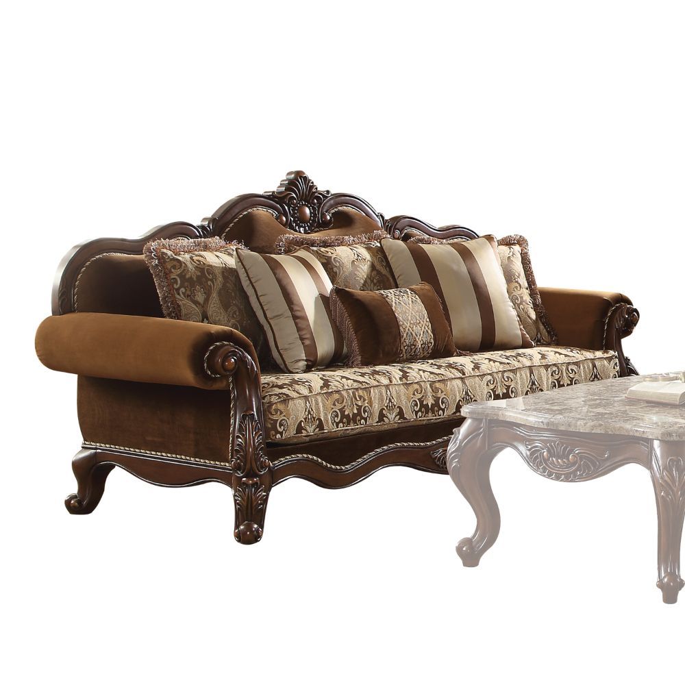With Classic elements of rolled carved and grooved camel back leading to the center top carving, the Jardena sofa is a piece of art as well as a comfortable addition to any living room. It features an arched tight back with loose cushions, and inviting po