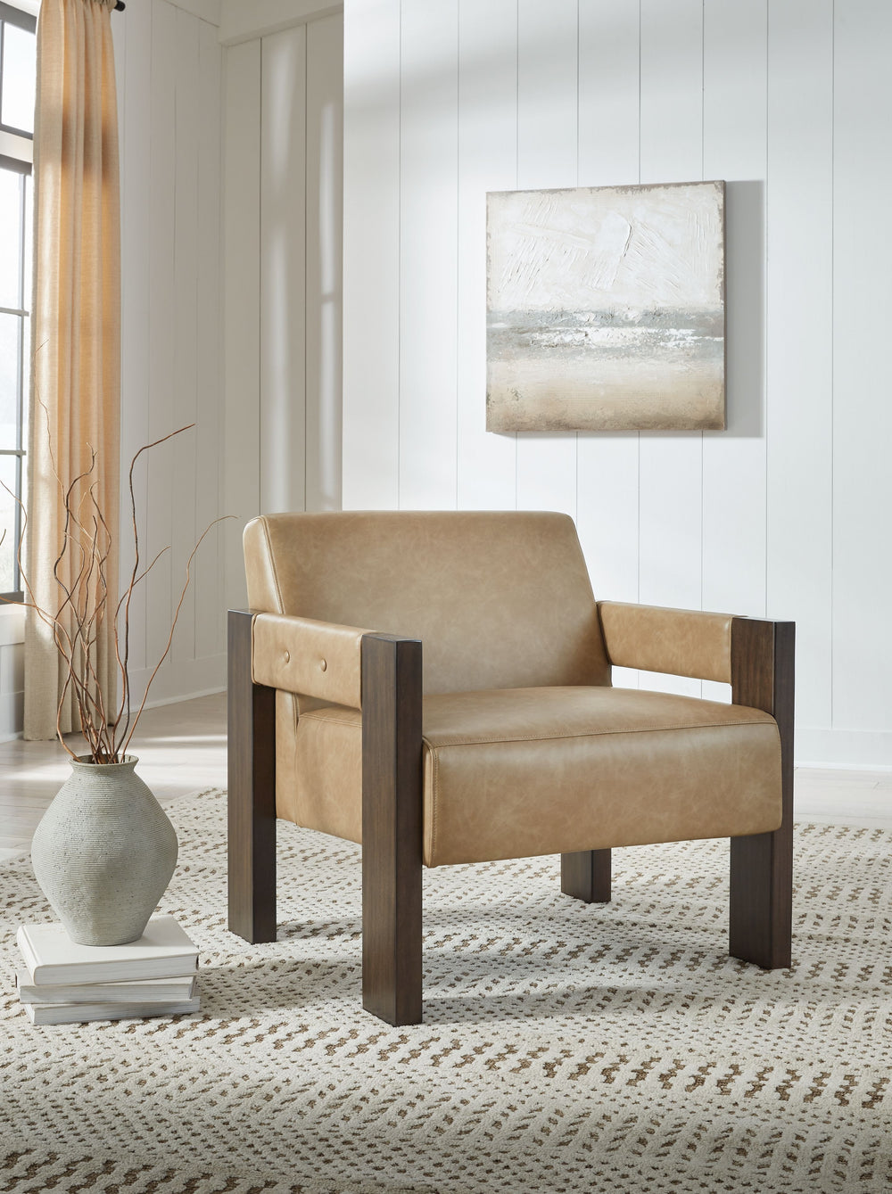 This accent chair is an ultra-contemporary addition to your seating area. Warm espresso-hued wood and neutral faux leather harmonize beautifully for a luxuriously welcoming vibe. Whether you-'re cozying up with coffee or settling in to stream your favorit