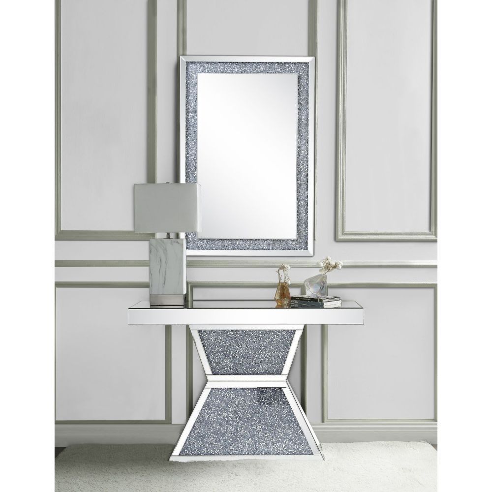 KD, Rectangular Console Table NO Storage Features: Mirrored Top, Mirrored Pedestal Base w/Faux Diamonds & Clear Glass CONSTRUCTION Mirrored Top (NO Apron): 4mm Beveled Mirror, MDF Mirrored Geometric Pedestal Base: 4mm Beveled Mirror, MDF, Faux Diamonds In