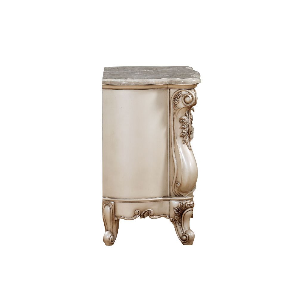 The Gorsedd mirror is exclusively designed and filled with romantic spirit. Expertly detailed, this arched mirror is crafted with elaborate carvings and raised-scrolled floral molding trim on its wood frame. Add glamorous French provincial charm with this