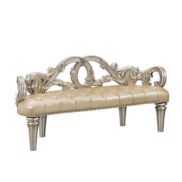  this regal bed invites you to hold court in its divine carved curves and details. The Champagne finis