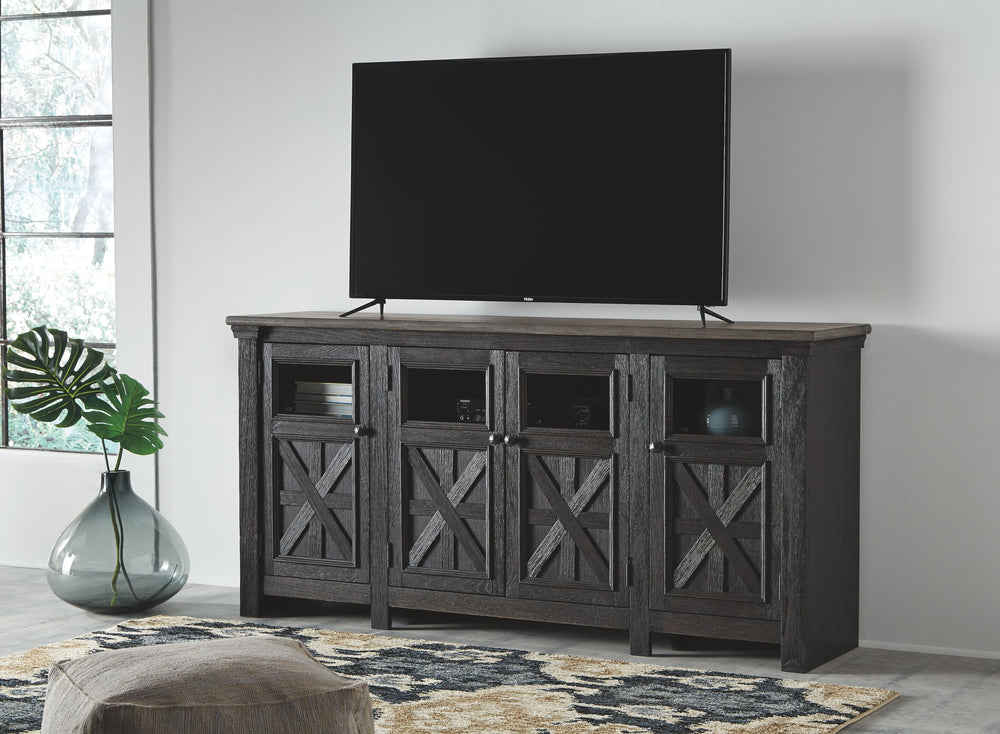 Shabby chic with a hint of down-home country, this TV stand appeals to todayâ€™s more relaxed sensibilities. Its richly rustic two-tone effect blends a textured black finish with a weathered gray-brown top for an easy-elegant aesthetic. Framed doors with 
