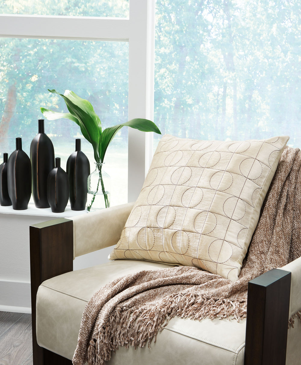 Looking to add a touch of luxury to a sofa or bed? This accent pillow brings touchable texture wherever you place it. The velvety-soft cover is embroidered with a chic geometric design, giving it an art deco-inspired flair. And with its versatile cream hu