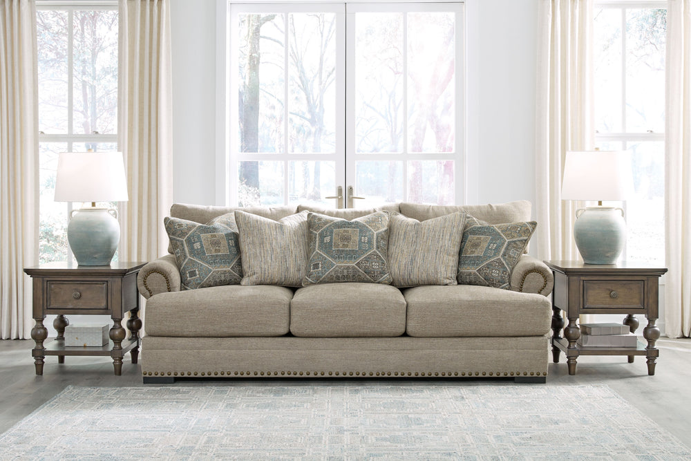 Looking to enhance your home-'s visual appeal? This sofa and loveseat set offers sophisticated design, comfort and elegance with tonal colors, roll arms and nailhead accents. Enjoy optimal coziness as you nestle into luxurious soft upholstery and feather-