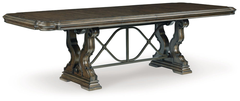 Opulent Traditional styling. Inspired by the grandeur and grace of Old World traditional style, this dining room collection is nothing short of stunning. A choice blend of materials is accented by detailed ornamental appliques large scaled decorative pila