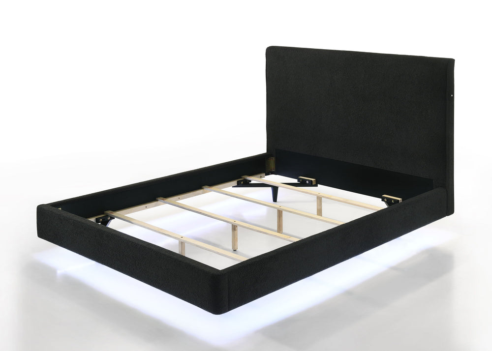 Discover the epitome of comfort and contemporary style with this floating illusion bed frame, accentuated by the underbed LED lighting. The rich black upholstery presents a tranquil and inviting aesthetic. Its high headboard offers an alluring charm and p