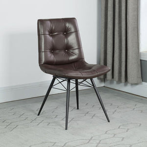  leatherette side chair. The beautiful brown upholstery adds warmth to a room. Decorative button tufting adds a trendy yet tasteful touch. Complete with sleek