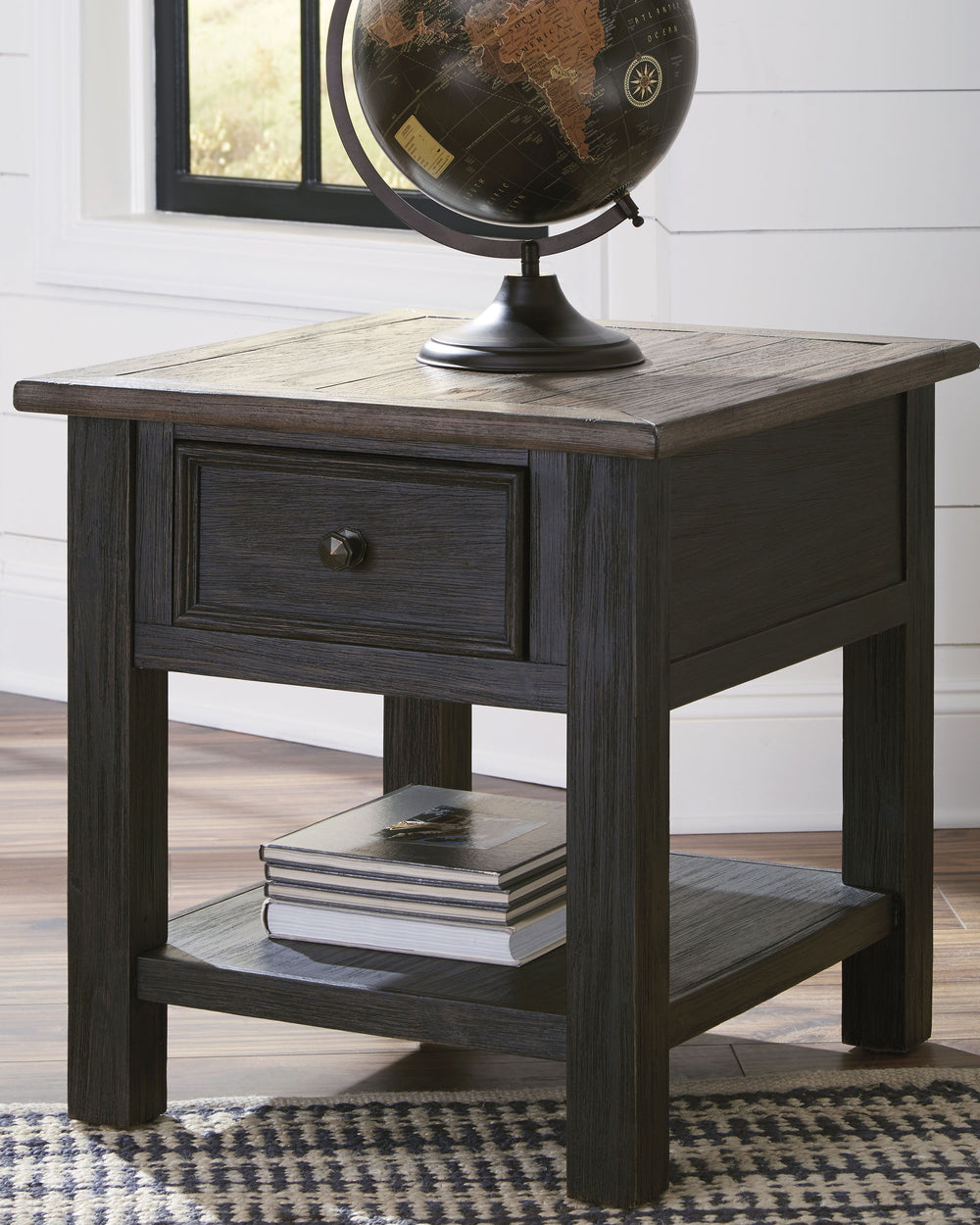 Shabby chic with a hint of down-home country, this rectangular end table is all the talk of todayâ€™s design world. Wood grain shows through the weathered gray-brown top in all of its earthy pleasure. Lovely traditional hardware adorns the framed drawer.<