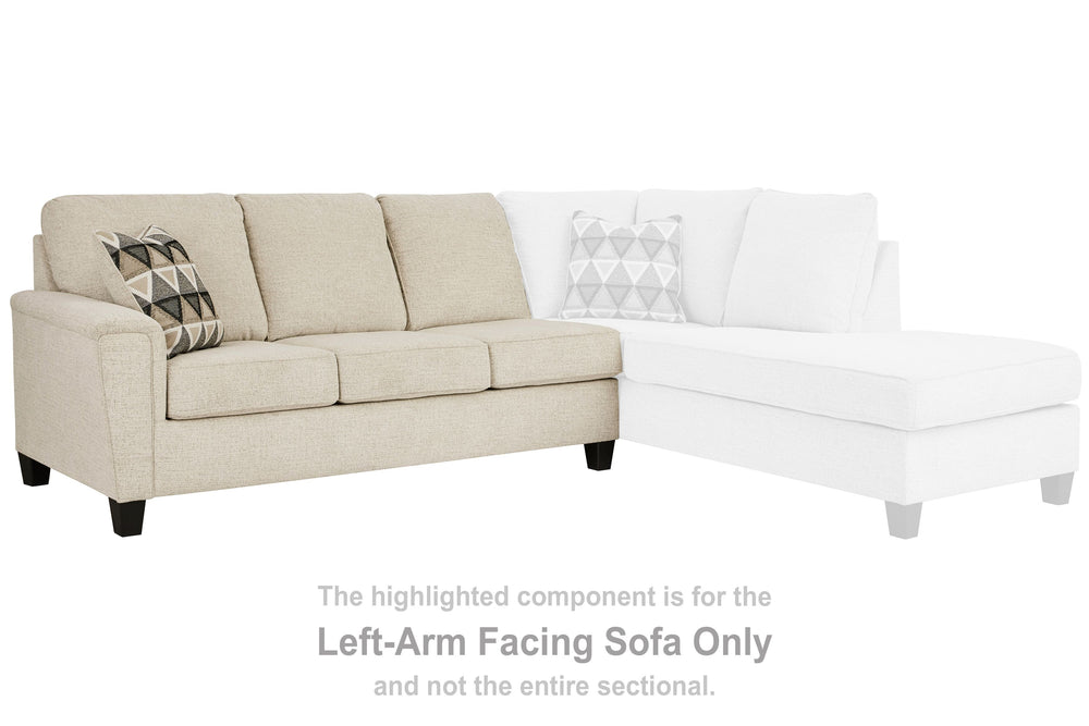 This left-arm facing sofa with corner wedge is made with polyester upholstery. Pairs with other items in the series to make a sectional.<br><br><b>Additional Dimensions</b><br><ul><li>Arm height: 27-"</li><li>Leg height: 4.5-"</li><li>Minimum width of doo