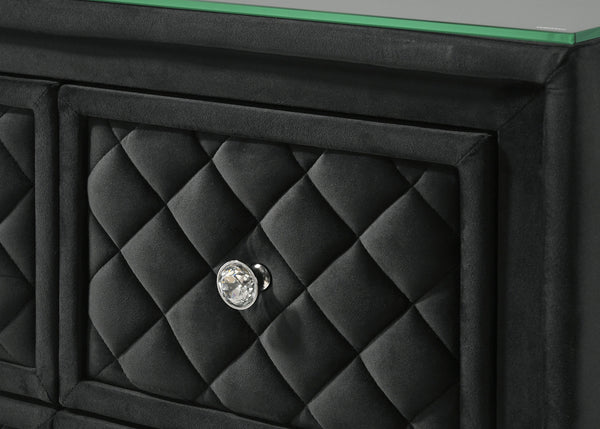  designed to make a bold statement. The centerpiece features an exquisitely tufted headboard with luxurious upholstery and intricate nailhead trim