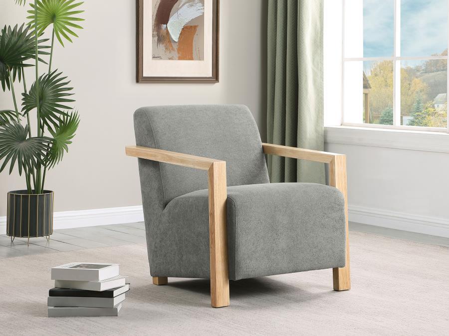 Put an inviting spin on a contemporary seating group with this modern accent armchair. Designed to stand out, it features soft, dimensional upholstery over plush foam cushions to create a smooth, sophisticated presentation. The chair boasts a smooth back 