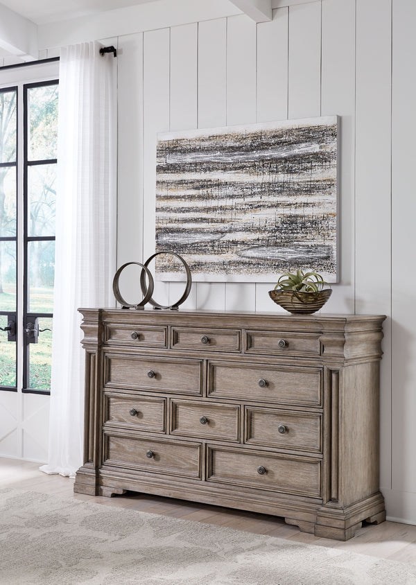  embodied by classic-inspired columns and a relaxed grayish brown finish. Inset framed drawers of various sizes are casually cool and packed 