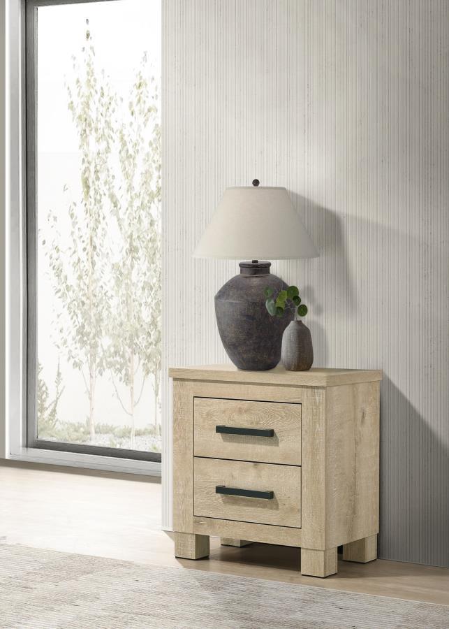 This two-drawer nightstand adds rustic charm and practical storage to your bedroom. Finished in weathered oak, it is crafted from engineered wood with a scratch-resistant veneer for lasting durability. Dark bronze handles add a bold, modern accent, while 