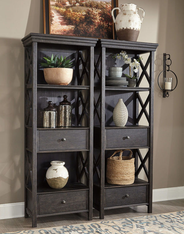 Unique two-tone finish with a combination of Oak and Acacia substrates combining a trendy textured antique black color with table and server tops finished in a textural weathered oak finish. Rectangular dining table features six convenient drawers for sto