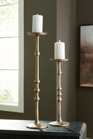  this candle holder set features a unique notched design. The pieces