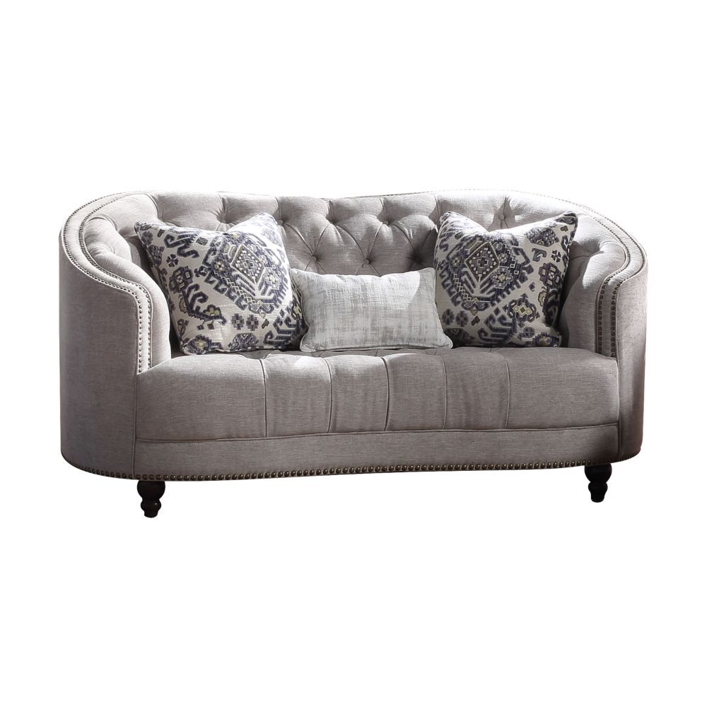 Comfort and style define the Saira sofa collection. These pieces features a gorgeous profile with its curved arms, button tufted cushions and wooden turned legs. The ample seats are generously padded to provide utmost comfort. This set is perfect for any 