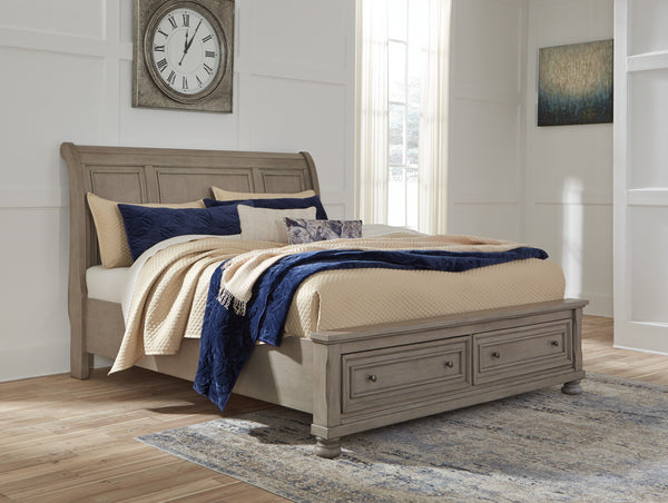 Satisfying your taste for tradition, this queen sleigh bed with storage sports serene sophistication. Forever classic design detailsâ€”inlaid panels, silvertone patina hardware and bun feetâ€”are so easy to love. Burnished light gray finish elevates the l