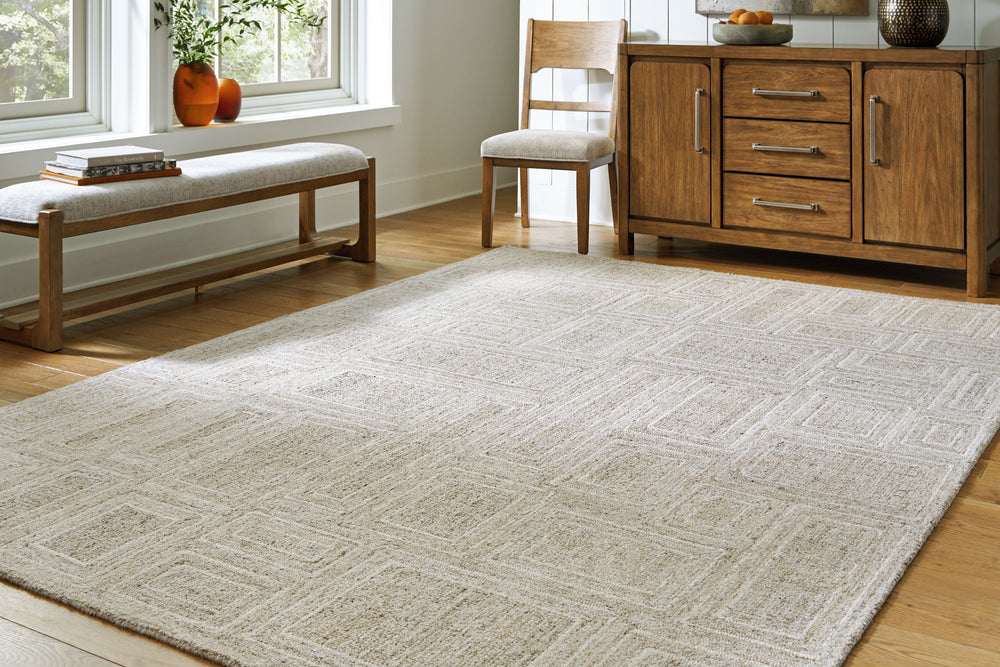 Pairing dynamic geometric shapes with subtle neutral colors, this area rug communicates a decidedly relaxed vibe. It works as well in a casual space as it does in a contemporary loft. Best of all, youâ€™ll love how the hand-tufted soft pile is an unparall