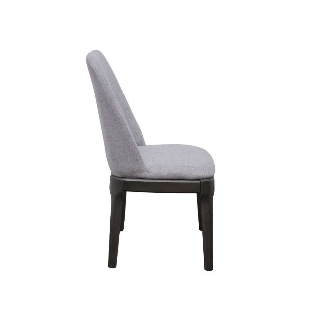 Attract attention to your dining room with the Madan side chair. Featuring a stunning light gray upholstery and walnut finish wood legs, this chair is both durable and stylish, complementing your contemporary home decor theme while guaranteeing to withsta