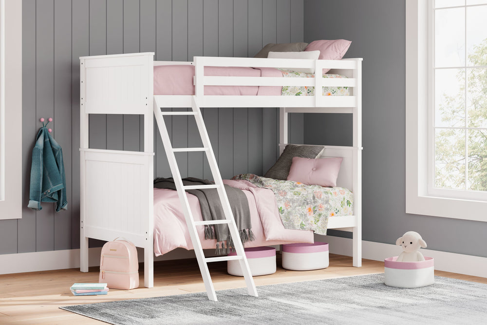 Maximize space and turn your kids-' bedtime into an adventure with this cool twin-over-twin bunk bed. It-'s an effortless addition to any bedroom, with a timeless Shaker style that-'s wonderfully finished in crisp white. Guard rails on the top bunk help e